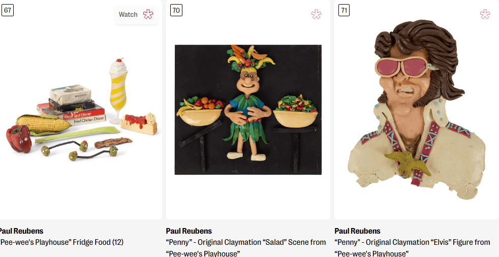 A collection of claymation food items from 'Pee-wee's Playhouse' including a milkshake, a hot dog, and various vegetables.