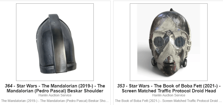 Close-up view of a Mandalorian Beskar shoulder armor piece from 'The Mandalorian' series, featuring a sleek metallic design.